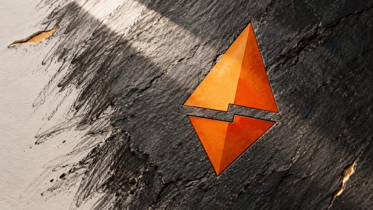 Cracked orange diamond emblem set into black stone